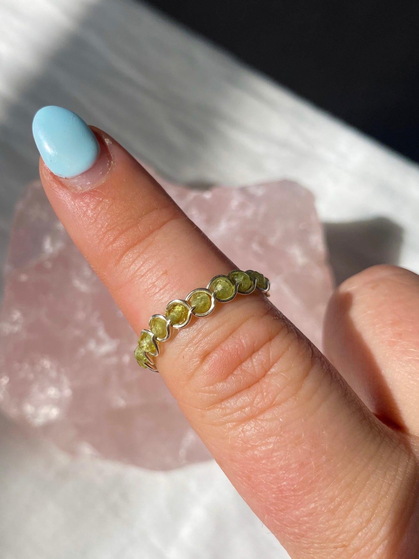 Silver peridot braided ring